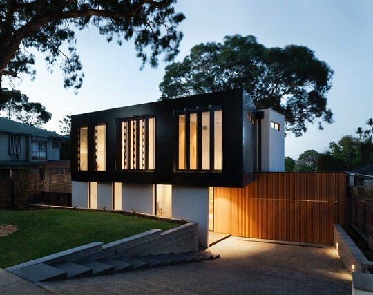 A residential home with a landscaped garden